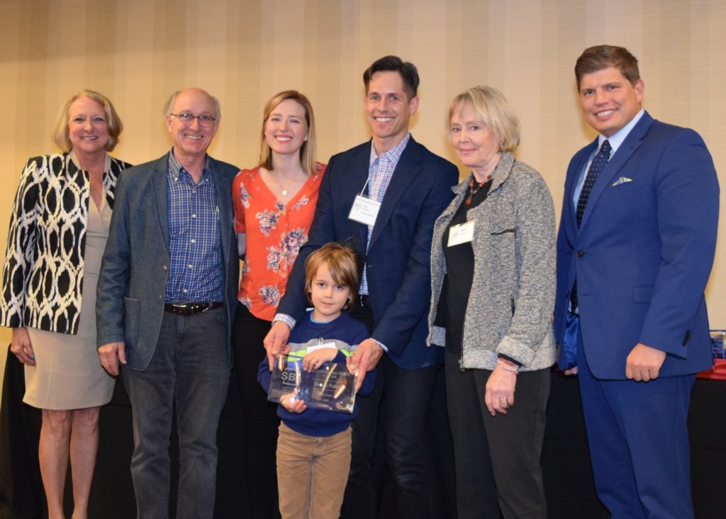 Deneen family accepting the award 