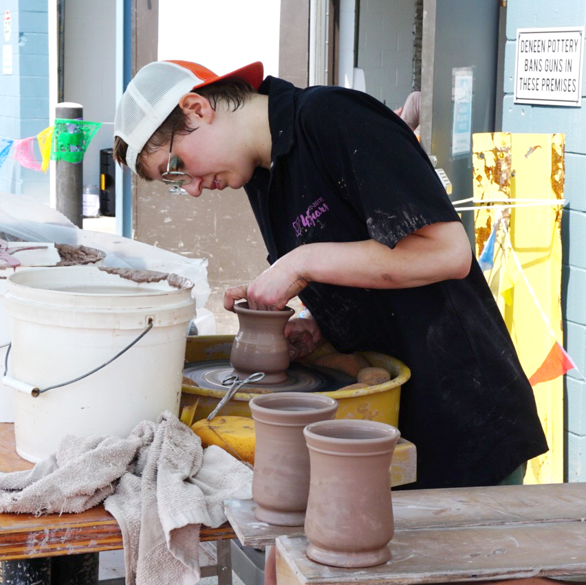 Katie working on a Pepin mug