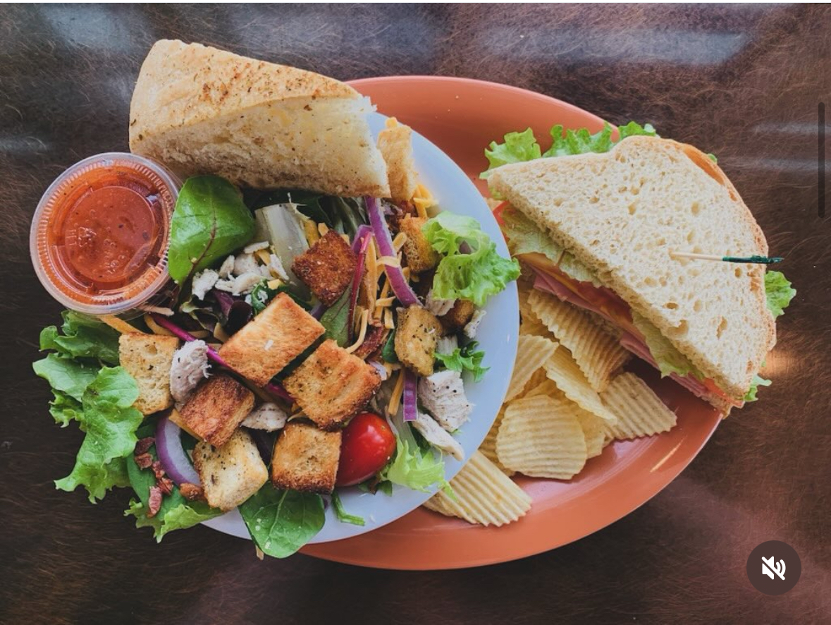 Photo of salad and yummy sandwich 